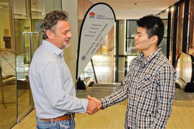 sps_1396_handshake Two men shaking hands